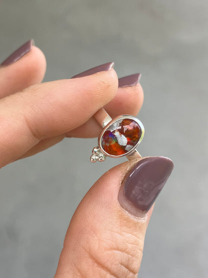 Anillo con ópalo de fuego, trinidad